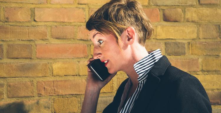 Woman listening on a mobile phone