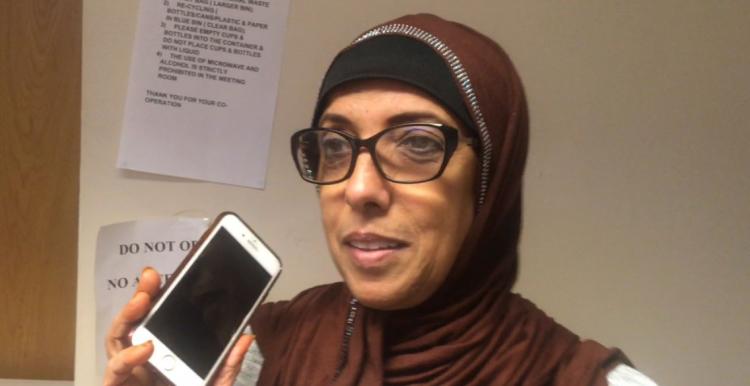 Lady in glasses and a headscarf