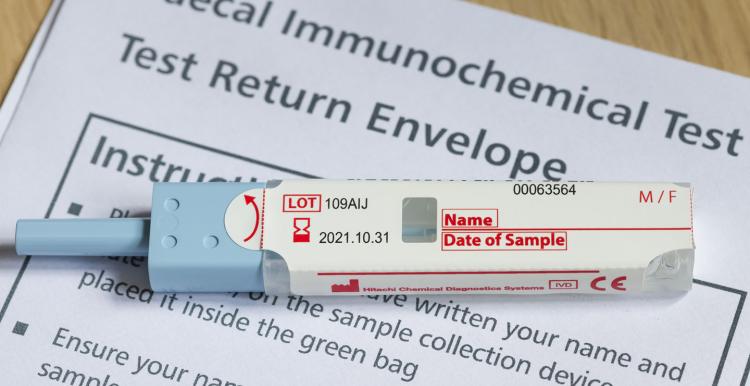 Closeup of FIT test (faecal immunochemical test), a fecal occult blood test for screening bowel cancer